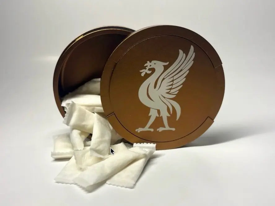 metal can filled with nicotine pouches on a clean surface UK