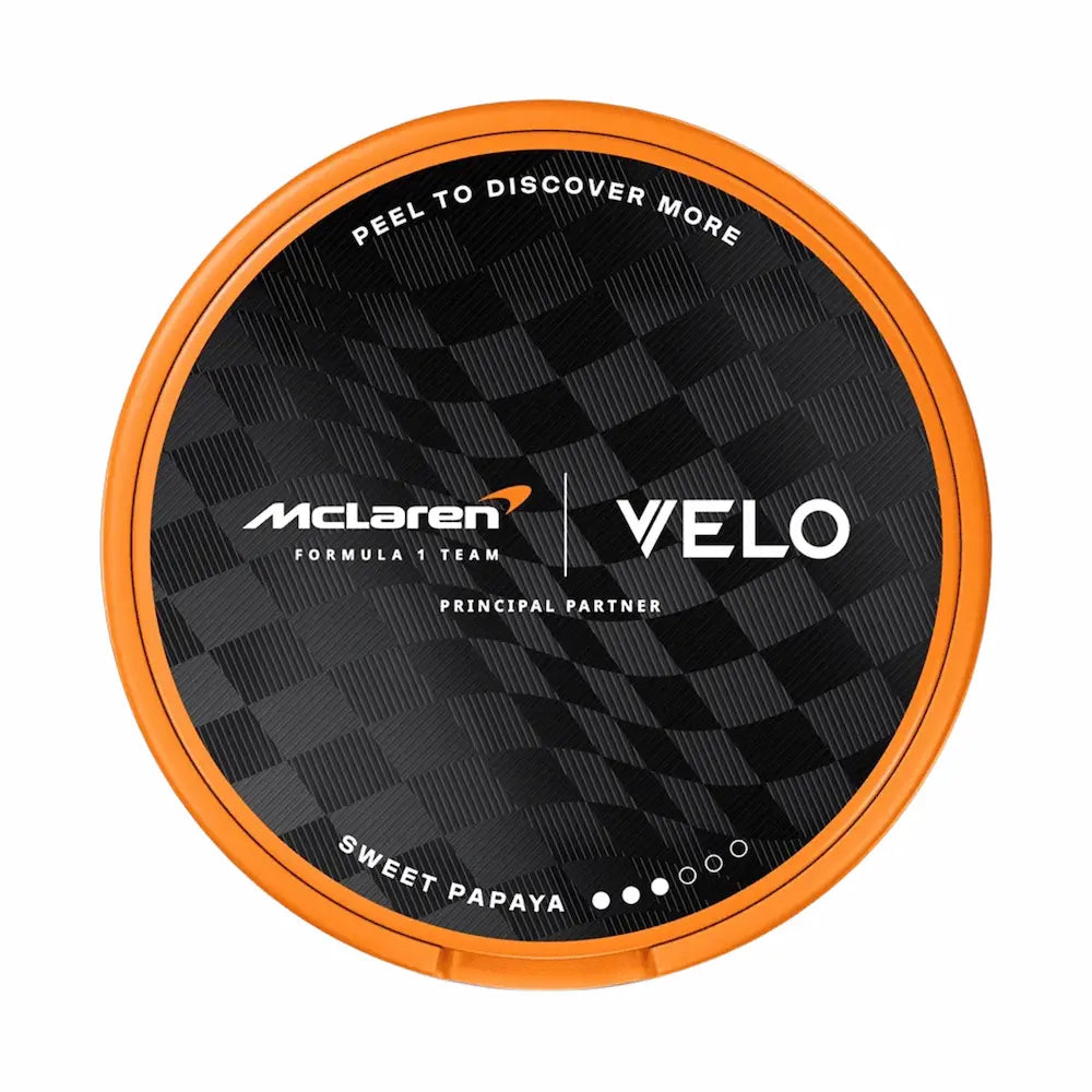 VELO McLaren Spicy Papaya 8mg nicotine pouch can with tropical papaya flavour and slim format